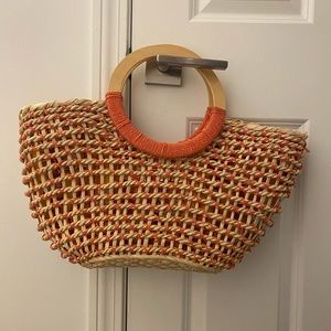 Orange and beige straw purse. Super cute for the summer
